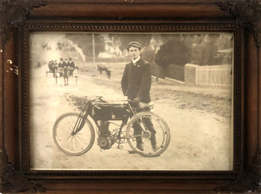 A.E. Sutton with Motorcycles
