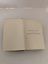 Inside cover of book with title