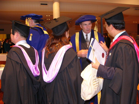 Graduates and "person in academic regalia