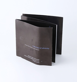 Cover of 10 page concertina fold brochure, black and blue.
