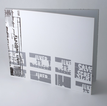 Perfect bound book, pages printed on satin coated in two colours (black and silver). 