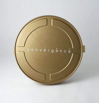 Bronze-gold metal film canister.