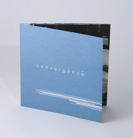 Ten page roll-fold brochure, printed in two colours (black and a metallic silver-blue).