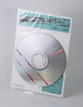 Clear cellophane sealed pack containing cardboard holder and CD Rom catalogue of third year, University of Ballarat, Bachelor of Visual Arts  (Graphic Design / Multimedia) graduating student work, 2001.  Card insert, with slots for holding CD Rom, printed full, four colour process.