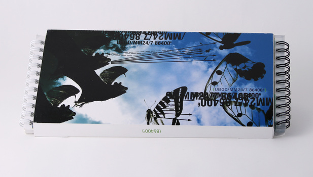 Cover of double spiral bound landscape booklet.