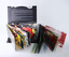 This is a double spiral bound landscape booklet, with 18 student works on paper bound to the left and 18 works on transparency bound to the right, to allow interplay and layering for multiple combinations by the reader/viewer.