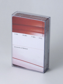 Two-piece acetate pack containing standard deck of playing cards.