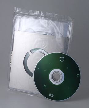 DVD printed full colour single sided, housed in a clear plastic DVD box, wrapped in custom-cut brushed aluminium, two clear stickers featuring circular graphic and UB logo. All enclosed in a cellophane bag.