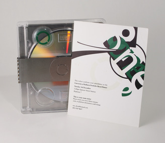 Photograph of square format promotional package (plastic case, aluminium wrap and DVD) and an example of the exhibition ticket.