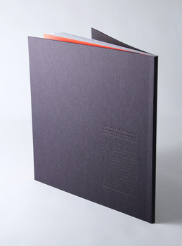 Back cover, textured black card cover, single colour black deboss text panel. Perfect/burst bound.