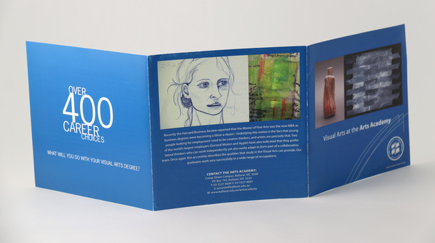 Front 3 pages of 6-page roll-fold brochure. Blue with white reversed text and student images.