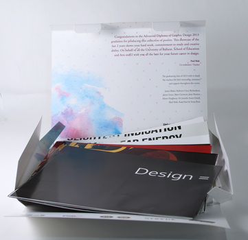 Opened package, introductory text inside lid, and display of folded student posters.