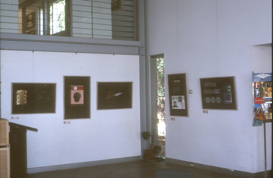 Exhibition space featuring 5 frames of student work