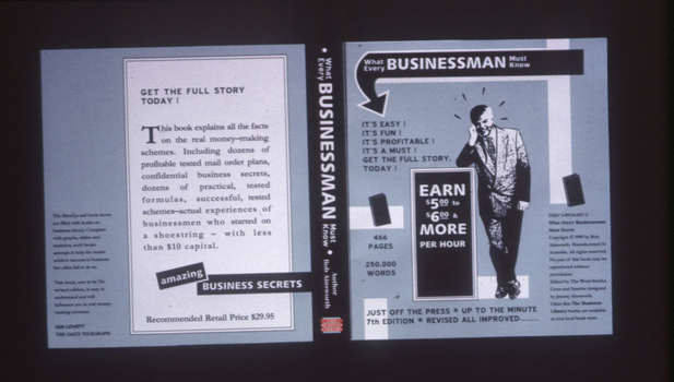 Book jacket. Black and grey featuring 1940s-50s style text and illustration of man in a suit 