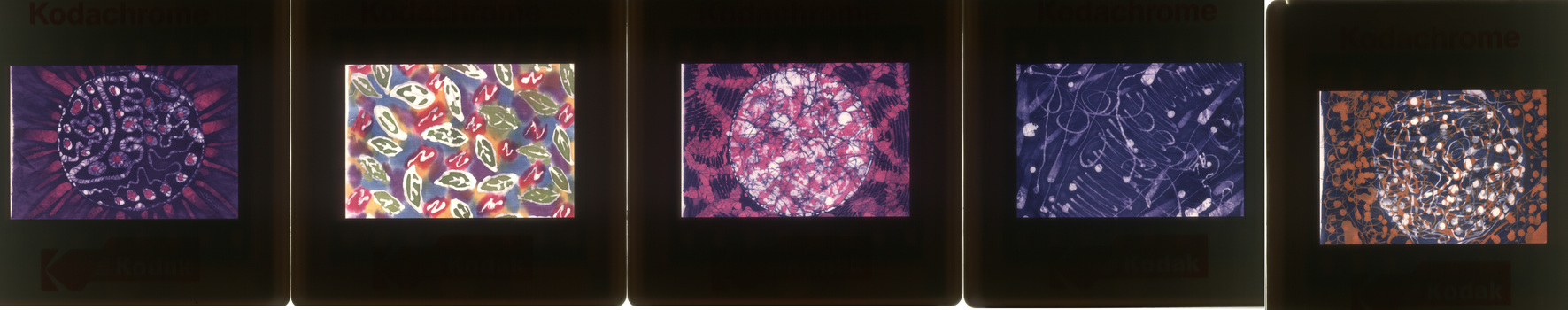 Five 35mm slides featuring creative student works by "Kylie"