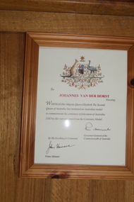 Photograph - Warrant award, Warrant award of Centenary Medal to Hans Van Der Horst granted by Queen Elizabeth the Second