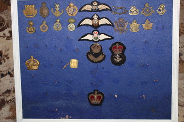 framed embroaded Patches &  Brass military Medals, Blue material background Framed Patches & Medals