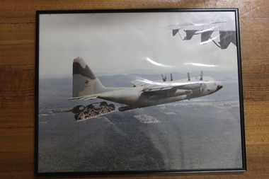 Picture Hercules Aircraft, Australian Hercules Aircraft with cargo air drop in progress