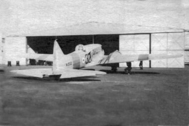 Black & White Photograph, Avro Anson in front of hangar, 1943 (estimated); WWII