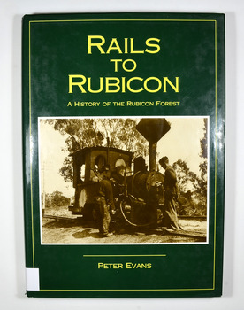 Hardcover. Green dust cover. Front cover photograph is Krauss 0-4-OWT, builder's No. 2459 of 1891, takes water at the western end of Rubicon Lane in 1934. Driver Bob Rees attends to his engine while brakeman Hayden looks on. End papers show a photograph of a man standing besides a timber railway trolley holding onto the brake lever. There is a group of men, some sitting and some standing, on piles of cut timber under a large, open shed in the background.There are also some small, timber, tent like structures standing next to the railway tracks. There is a forest in the far background. Written in white is the line "Mr Clarke & Kidd's Sawmill"