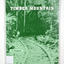 Paperback. Front cover has an old photograph of a timber railway leading into a forest. There is also a man standing at the side of the railway.