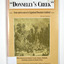 Paperback. Front cover has a drawing depicting two horses carrying packs followed by a man mounted on a horse. There is also two men on foot following with packs and walking poles. They are walking along a forest track that has some tree stumps alongside it.The back cover has two colour photographs. The top one is of an old wooden building with what appears to be an attached lean to. Both of the buildings have stone chimneys. There is a group of people sitting and standing outside the main building. The bottom photograph appears to be the ruins of a building and a fence. There are three people viewing the ruins.The captions accompanying the photographs are: History revisited - O'Sullivans Old Toombon Hotel Recreated and Remnants of a Bygone Mining Era.