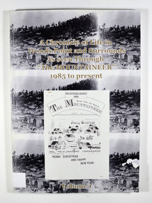 Paperback. Front cover has 3 of the same black and white photograph of old Woods Point. There is also a photograph of a Christmas themed front cover of The Mountaineer from December 1991. Back cover has 2 of the same photograph. Photograph is of a family standing next to a car that is parked outside the Wood's Point Hotel. In the background can be seen a shop on the left hand side of the road.