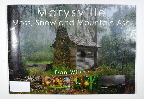Paperback. Front cover has a main photograph of Keppel's Hut on a misty day in the rainforest. There are also four small photographs along the lower edge of the front cover. They are of a Mountain Ash canopy, a Drosera Peltata, a Brown Tree Frog and a view of the smoke plume on Black Saturday.