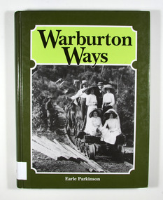 Hardcover. Front cover has a photograph of a group of people sitting on a small railway cart which is being drawn by horse along a railway track. There is also a man standing to the left of the railway track. The photograph appears to have been taken in the late 1800's.