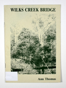 Paperback. Front cover has an old photograph of the Wilks Creek Bridge.