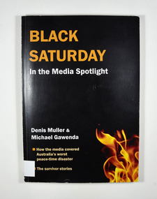 Black front cover. Photograph of flames on the lower right hand corner of the front cover. Back cover has the blurb about the book.