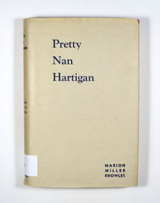 Dust cover is a buff color with the title and author's name in navy blue lettering on the front cover and spine.