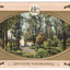 Printed postcard showing a coloured photograph of a small hut in the bush land at Marysville, Victoria. The oval shaped photograph is surrounded by a gold printed frame, the Australian coat of arms is centered at top. On the reverse is a handwritten message written in black ink. There is a space to place a postage stamp.