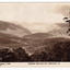 Shows the view of hills taken from Bald Hill near Marysville. In the foreground can be seen some trees. In the background can be seen a series of heavily forested mountains. The Rose Series of postcards P. 2293. On the reverse of the postcard is a space to write a message and an address and to place a postage stamp. The postcard is unused.