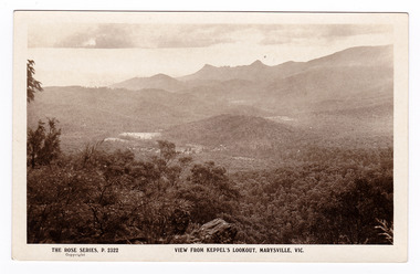 A black and white photograph of the view of Marysville from Keppel's Lookout near Marysville. The Rose Series of postcards No. P. 2322. On the reverse of the postcard is space to write a message and an address and to place a postage stamp. The postcard is unused.