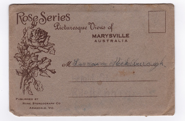  Shows a grey envelope which holds 12 black and white photographs of natural attractions in Marysville and surrounding area. On the front of the envelope is written a name.