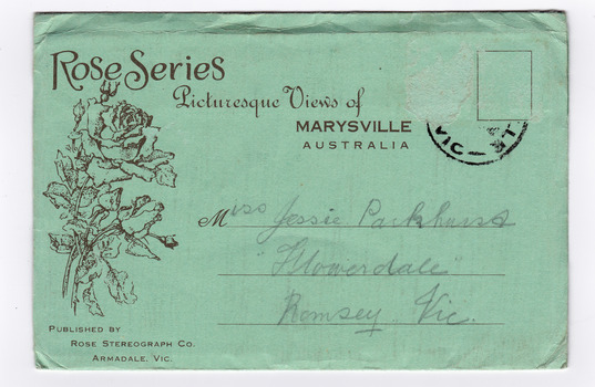 Shows a light green envelope which holds 12 black and white photographs of natural attractions in Marysville and surrounding area. There is an address written on the front of the envelope and a date stamp in the top right hand corner.