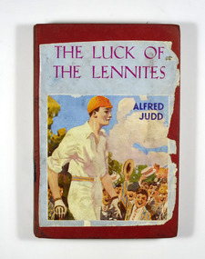 The cover is red. On the front cover is a picture depicting a cricket player being cheered by a group of boys in school uniforms waving their hats. It appears that the front picture has been cut from the book's dust cover and adhered to the front cover. The title of the book is in red writing at the top of the picture and the author's name is in black writing across the body of the picture. The title, the author and publisher are written in gold ink down the spine of the book.