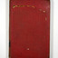 The cover is red. It appears that the book's dust cover has been removed and the picture from the front cover had been adhered to the front cover. That has been partly removed leaving behind residue. The title of the book and the author's name are in black on the front cover.