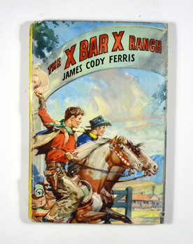 On the front cover is a picture of two boys dressed in cowboy outfits riding on two horses. In the background is a farmhouse with mountains in the far background. The title of the book and the author's name are on a banner across the top of the front cover. The back cover has information regarding 'The Challenge Series For Boys and Girls'.