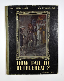 Front cover has a picture depicting Joseph and Mary, who is astride a donkey, talking to a group of men in the doorway of a building. The front cover is black with the title and series name in white. The back cover has information about a series of Bible Picture Story Books that this book is one of.