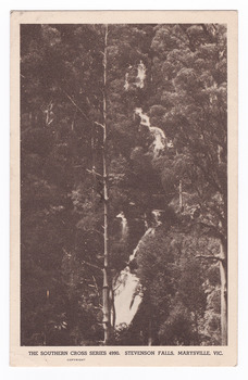 Shows Steavenson Falls, Marysville in Victoria. Shows the falls cascading down the mountain surrounded by forest. The reverse of the postcard has a handwritten message.