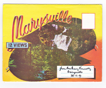 Colour fold out postcard featuring a picture of a waterfall and river scene on the front cover. The postcard contains a number of colourised photographs of Marysville scenes and landscapes including Steavenson Falls, the main street of Marysville, The Crossways Hotel, the Fruit Salad Farm and Nicoll's Lookout. Photographs are printed on both sides of the foldout. On the front of the envelope is a space to write and address and to place a postage stamp. The postcard is unused.