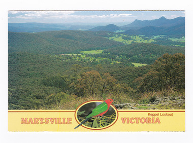 Shows the view of Marysville and the surrounding mountains in Victoria from Keppel Lookout. The title of the postcard is along the lower edge of the postcard and in middle of the title is a small photograph of a King Parrot sitting on some gum leaves. On the reverse of the postcard is a space to write a message and an address and a space to place a postage stamp. The postcard is unused.