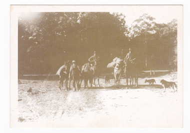 Shows the Keppel Family preparing to muster cattle. All are on horseback. On the reverse of the postcard is a space to write a message and an address and place a postage stamp. The postcard is unused.