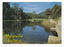 Shows Darmody's Lake in Marysville in Victoria. Shows the lake surrounded by forest and forested mountains. On the reverse of the postcard is a space to write a message and an address and to place a postage stamp. The postcard is unused.