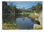 Shows Darmody's Lake in Marysville in Victoria. Shows the lake surrounded by forest and forested mountains. On the reverse of the postcard is a space to write a message and an address and to place a postage stamp. The postcard is unused.