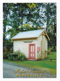 Shows the original Police Station in Marysville in Victoria. Shows a small, weatherboard building with a stone chimney. On the reverse of the postcard is a space to write a message and an address and to place a postage stamp. The postcard is unused.
