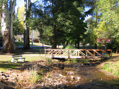 Shows a bridge over the Steavenson River in Marysville in Victoria.