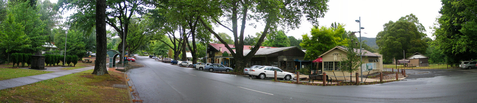 Shows Murchison Street in Marysville in Victoria. Shows the view looking up Murchison Street. In the left of the photograph is The Corner Cupboard Cafe along with other building set along the street.